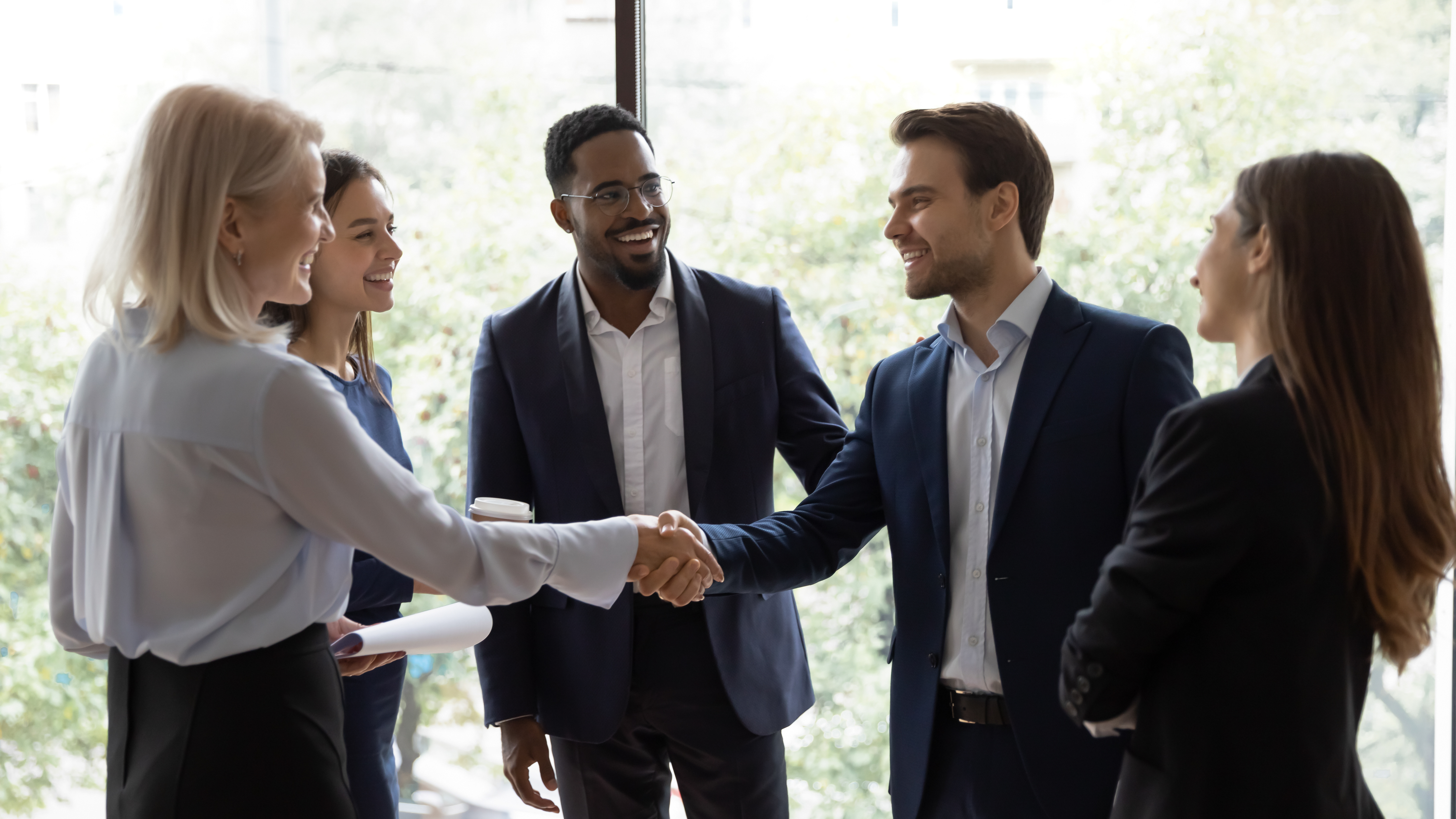 group of people shaking hands